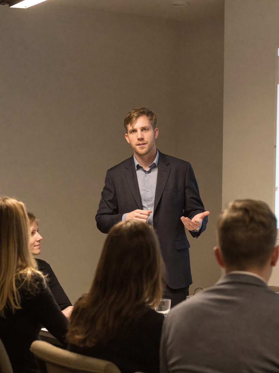 Reuben Alexander speaking at a corporate event